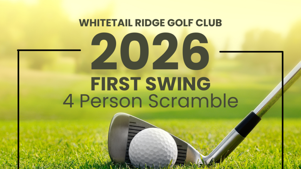 A close-up, low-angle shot of a golf club head resting behind a white golf ball on a lush green grass tee box. The background is a soft-focus view of a sunny golf course. Large, dark green and gray text centered over the image reads "WHITETAIL RIDGE GOLF CLUB 2026 FIRST SWING 4 PERSON SCRAMBLE." The text is framed by thin black lines on the left and right.